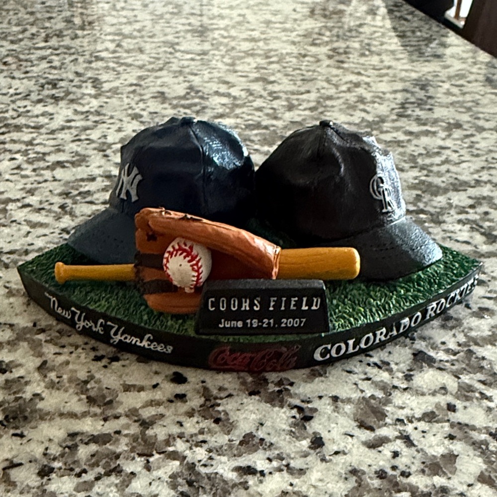 Rockies and Yankees Baseball Cap Display
